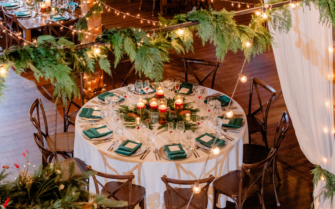 Winter wedding with green napkins and red candles