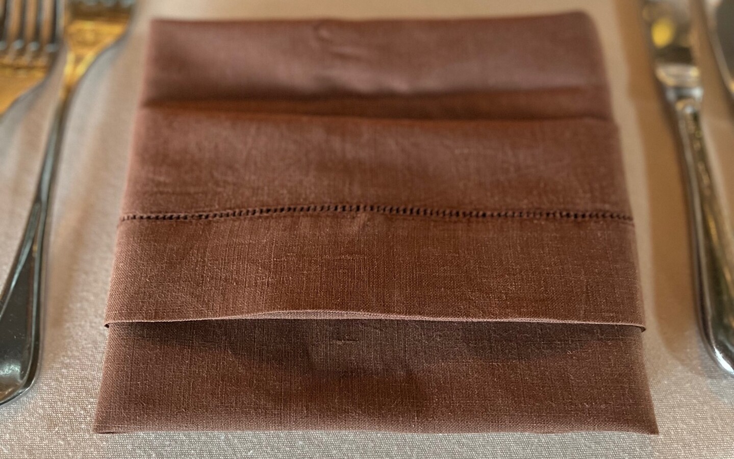 brown hemstitch napkin close up