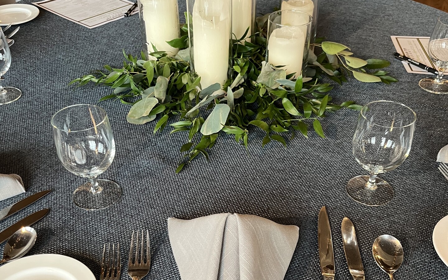 slate faux burlap with greenery and candles