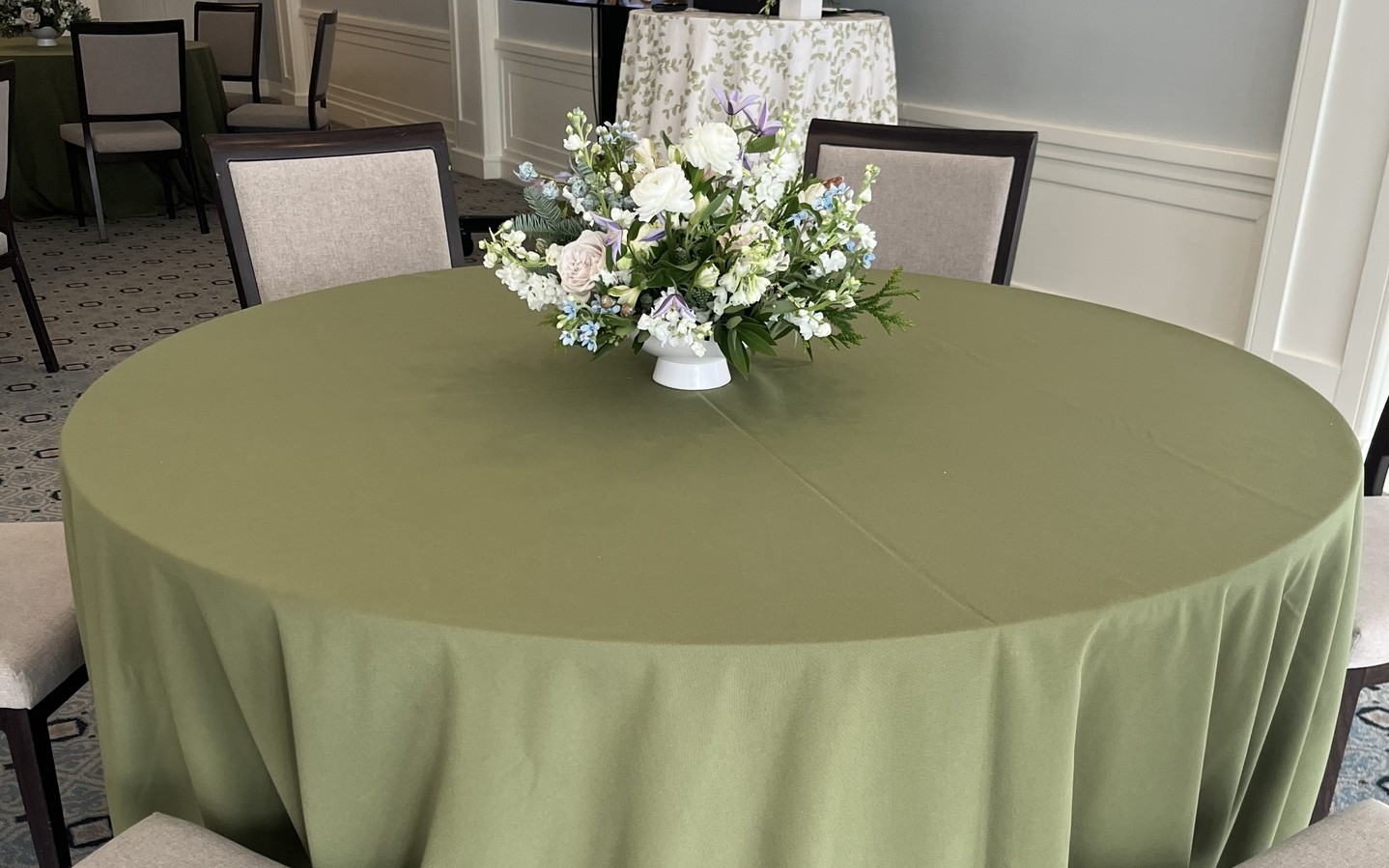 Dark olive tablecloth with centerpiece