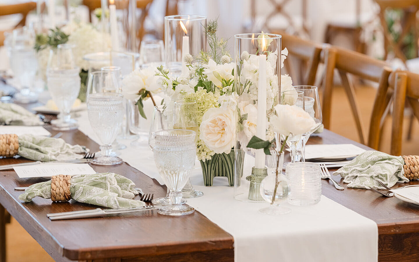 White table runner with white wedding flowers